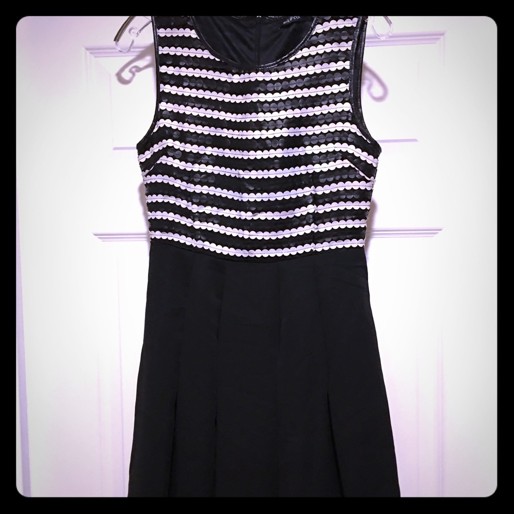 Black and white patterned leather bodice dress